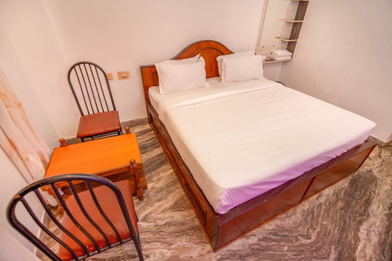 Double Room with King Bed, large bed and chairs