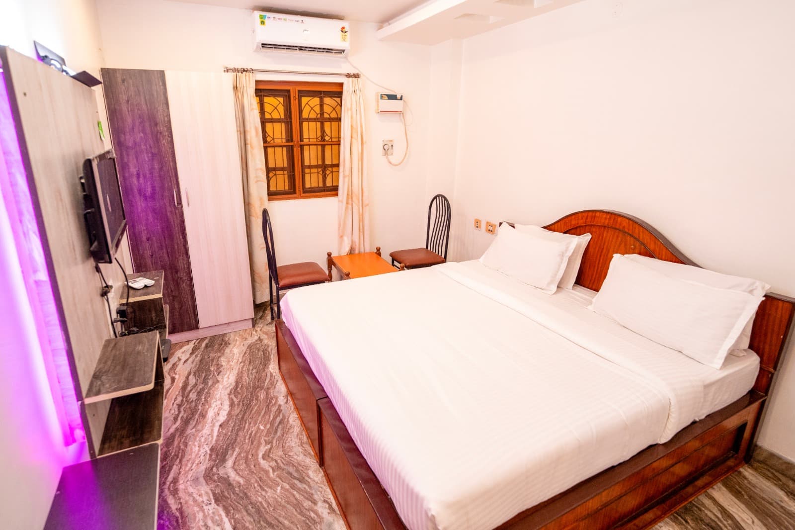 Double Room with King Bed, large bed and wardrobe