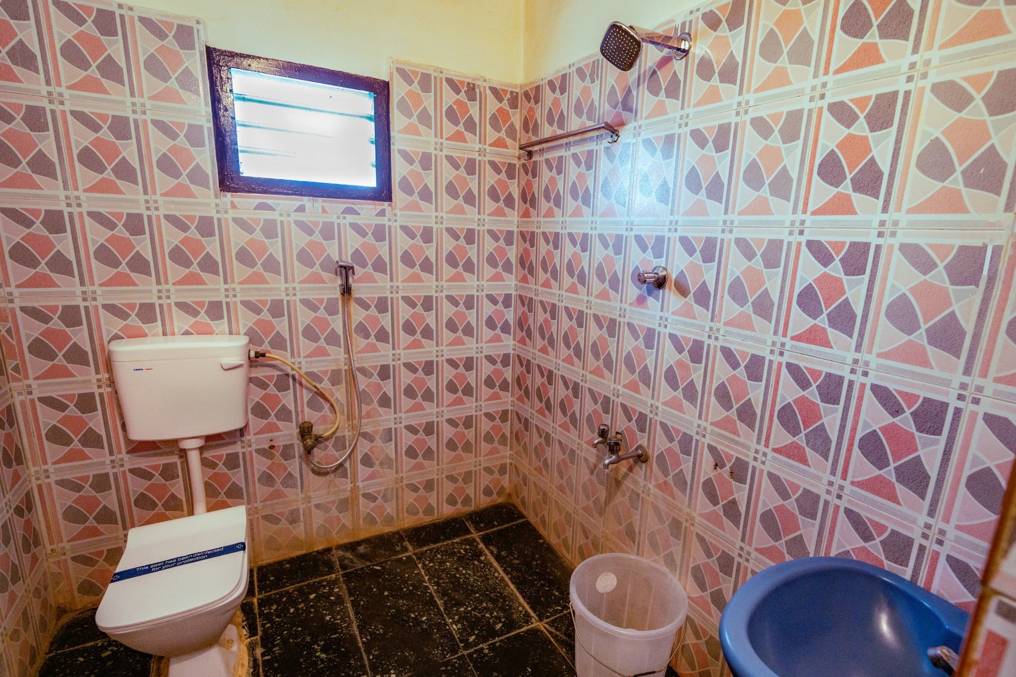 Family Room with Private Balcony, en-suite bathroom with geometric tiles