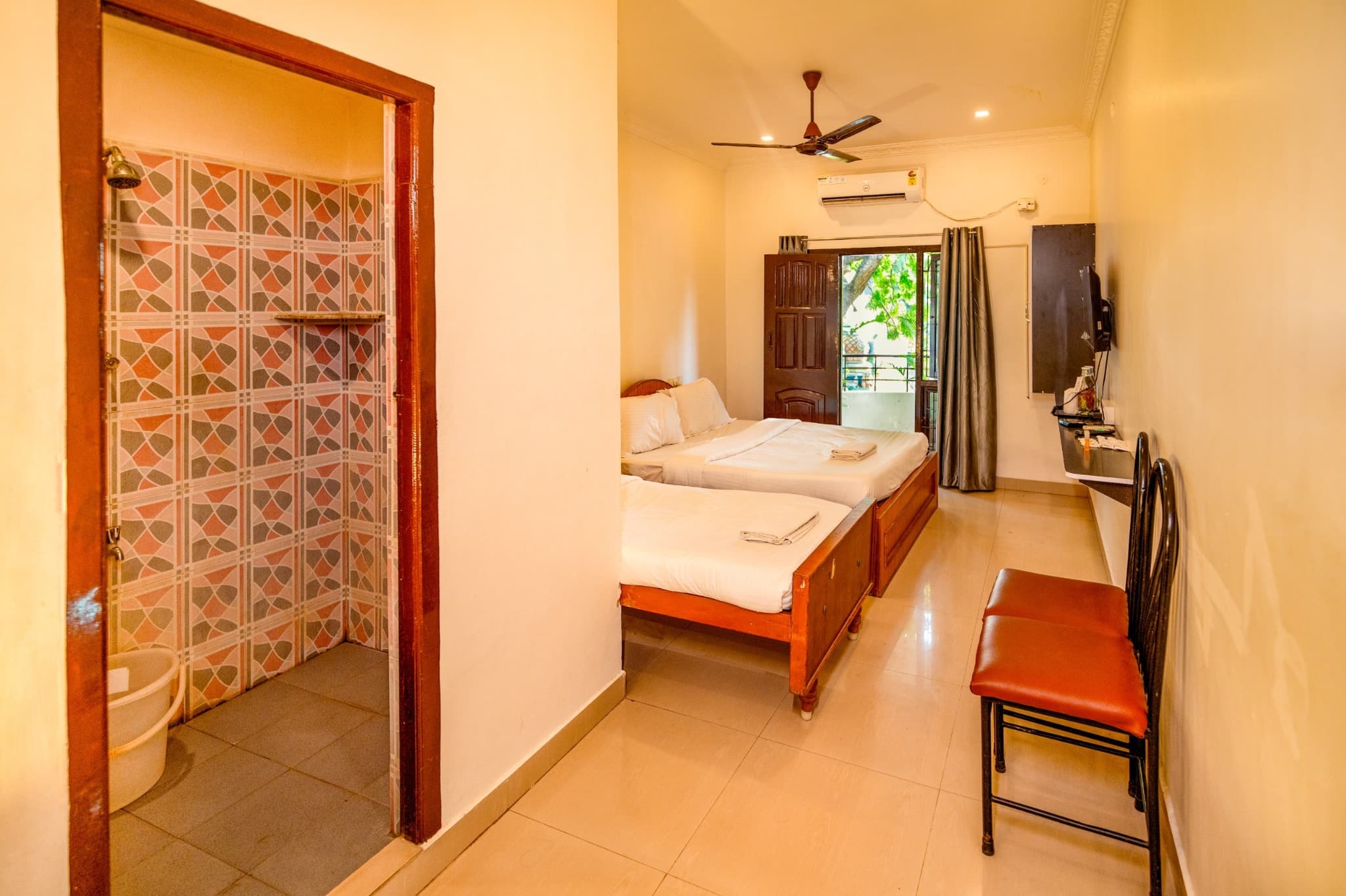 Triple Room with Balcony, room and balcony door