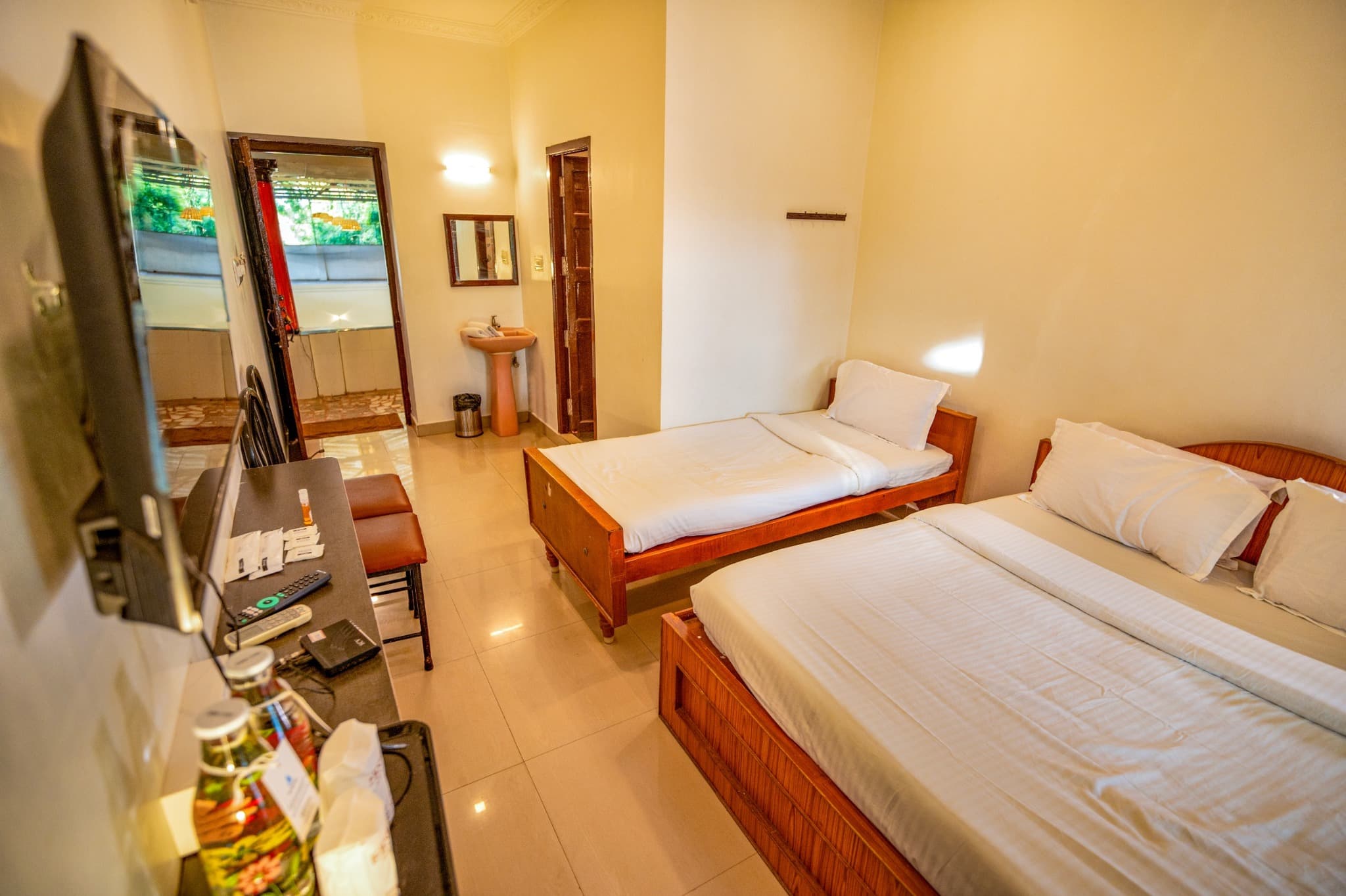 Triple Room with Balcony, large bed and single bed overview